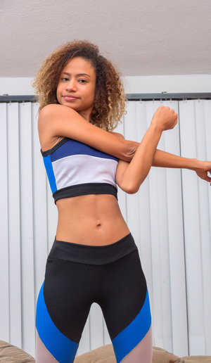 18 year old female Chloe Dash undressing on yoga mat on lawn